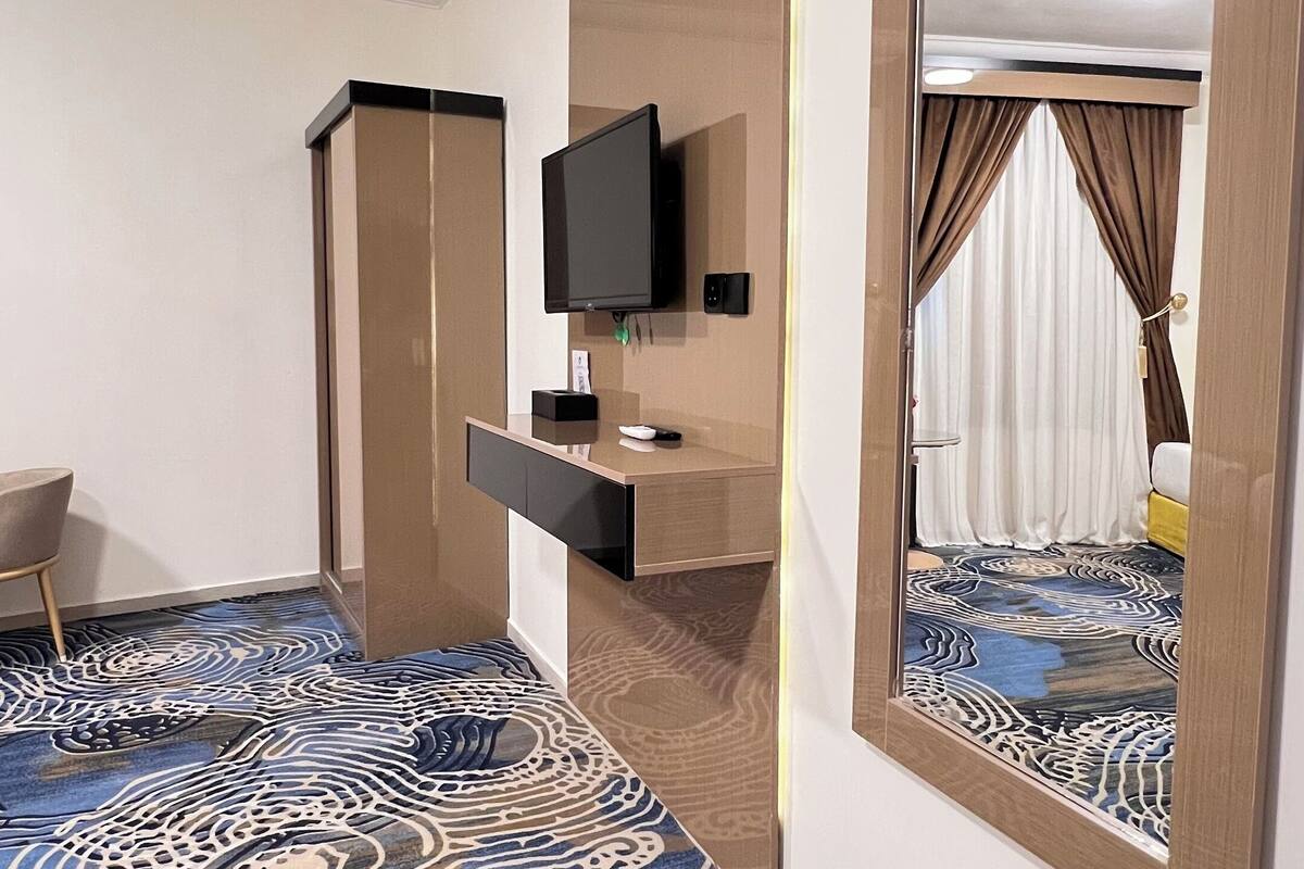 Habitación cuádruple, varias camas | 1 dormitorio y ropa de cama de alta calidad