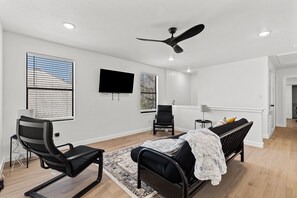 Apartment (3 Bedrooms) | Living area | 50-inch TV with digital channels