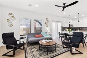Apartment (3 Bedrooms) | Living area | 50-inch TV with digital channels