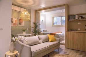 Estúdio clássico | Área de estar | Smart TV 45 polegadas com canais via satélite