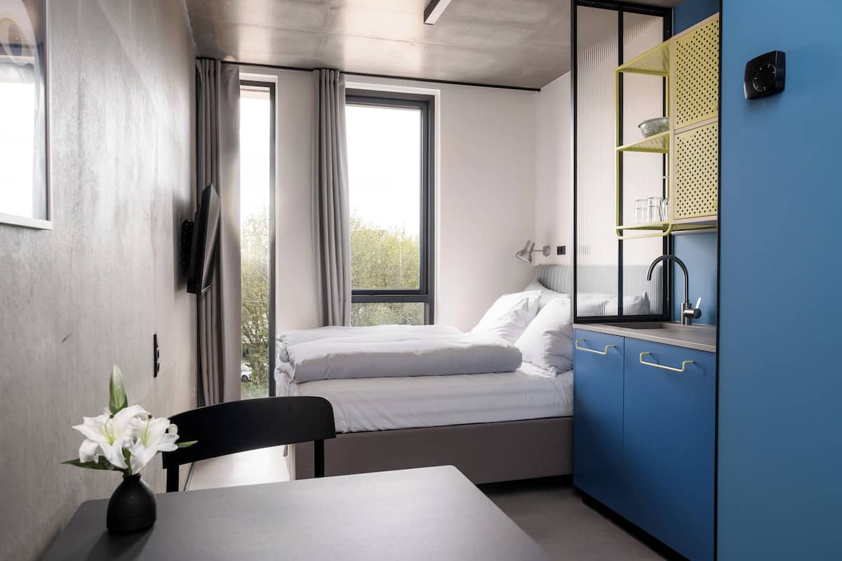 Studio Design | 1 chambre, literie hypoallergénique, couette en duvet, décor unique