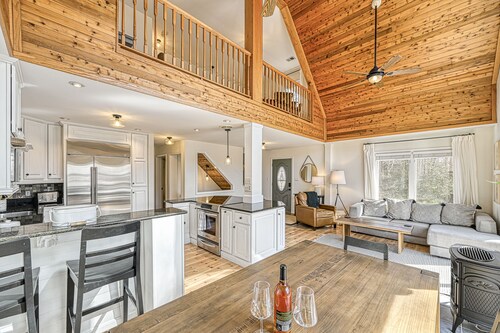 Peaceful Lakefront Retreat with Hot Tub, Firepit and Boat Dock