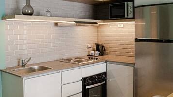 Exclusive Apartment | Private kitchenette | Fridge, microwave, oven, stovetop