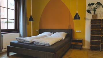 Comfort Quadruple Room, City View | Individually furnished, blackout drapes, iron/ironing board, travel crib