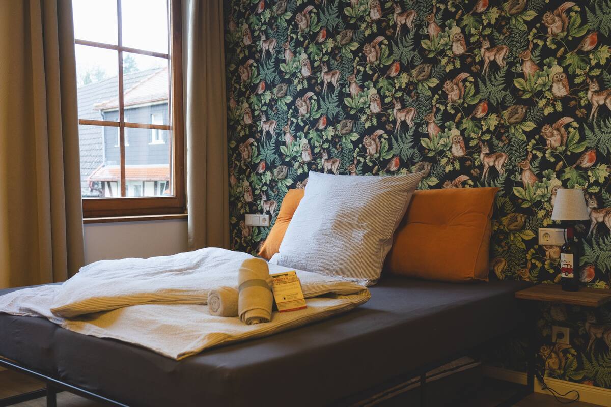 Quadruple Room, City View | Blackout drapes, iron/ironing board (on request), travel crib