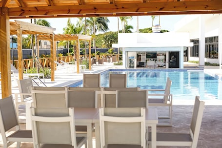 2 outdoor pools, open 7:00 AM to 7:00 PM, pool umbrellas, sun loungers