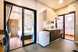 Villa – royal | Oppholdsområde | En 32-tommers Flatskjerm-TV med digitale kanaler