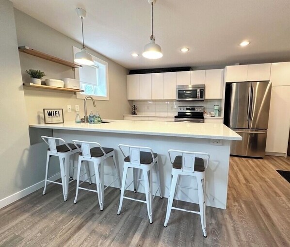 Fridge, microwave, oven, stovetop - Cozy 2 Bedroom Suite Near Hiking and Parks! (Lethbridge)