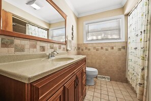 Shower, towels, soap, toilet paper