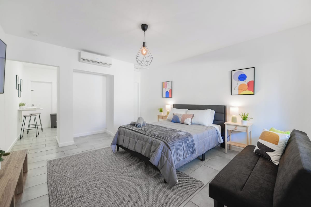 Comfort Studio | Premium bedding, blackout drapes, iron/ironing board, free WiFi