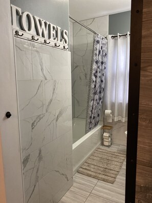 Hair dryer, towels, soap, shampoo