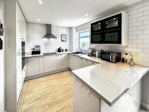 Dishwasher, high chair, cookware/dishes/utensils