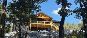 “Home On The Hill"
This new vacation rental will not disappoint! Lake front!