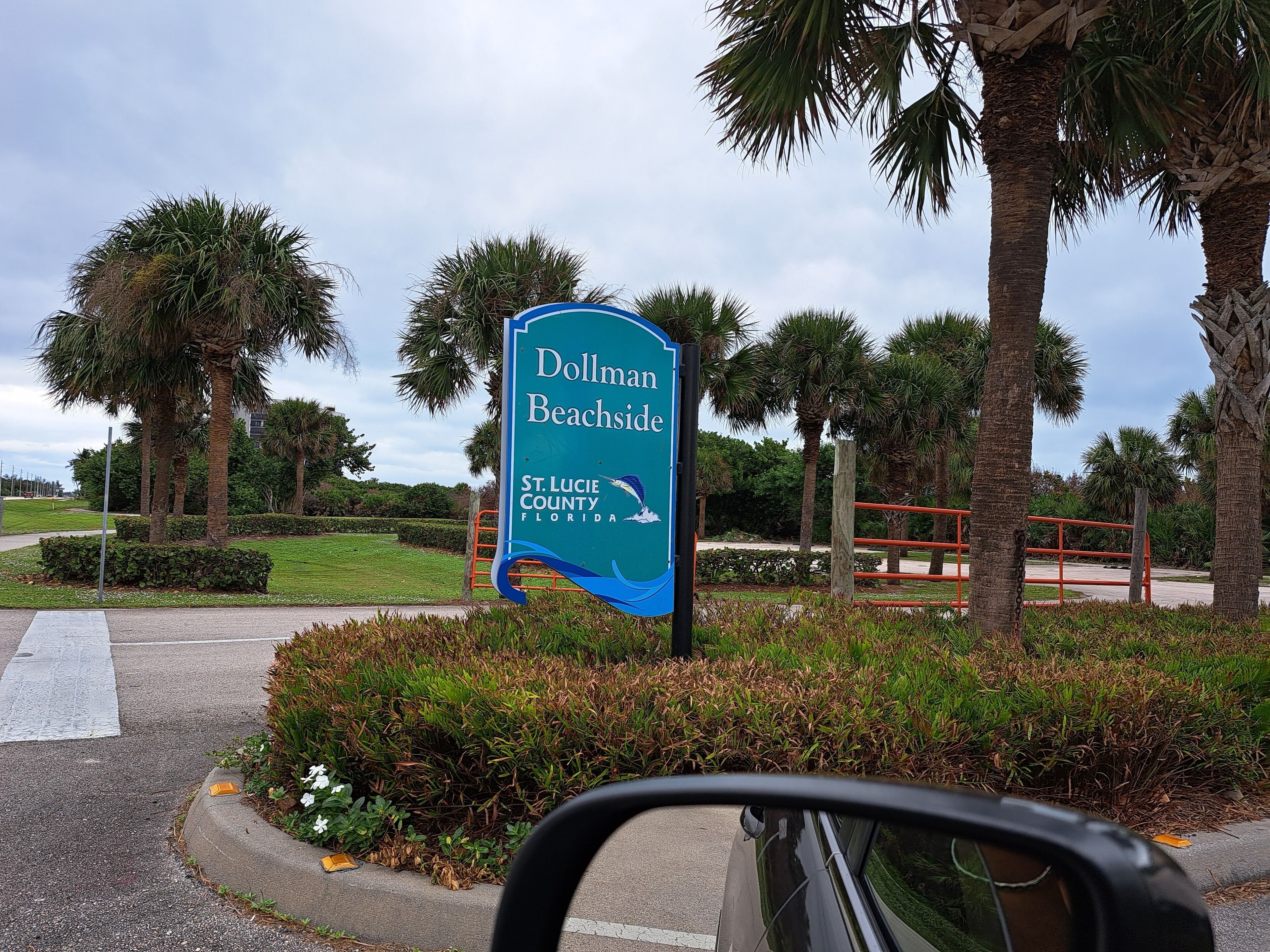 A sign for Dollman Beachside in St. Lucie County, Florida.
