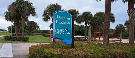 A sign for Dollman Beachside in St. Lucie County, Florida.