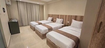 Standard Triple Room, City View | Minibar, free WiFi, bed sheets