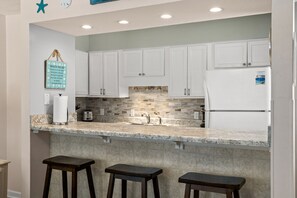 Fridge, microwave, oven, stovetop - Cozy beachfront condo on the first floor. (Panama City Beach)