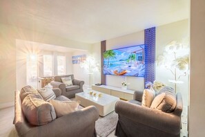 TV connectée, cheminée, jeux vidéo, lecteur de DVD