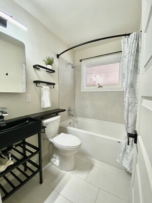 Hair dryer, towels, soap, shampoo