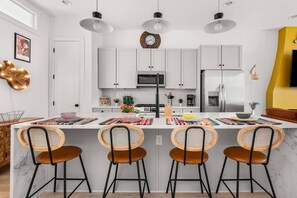 Fridge, microwave, dishwasher, coffee/tea maker