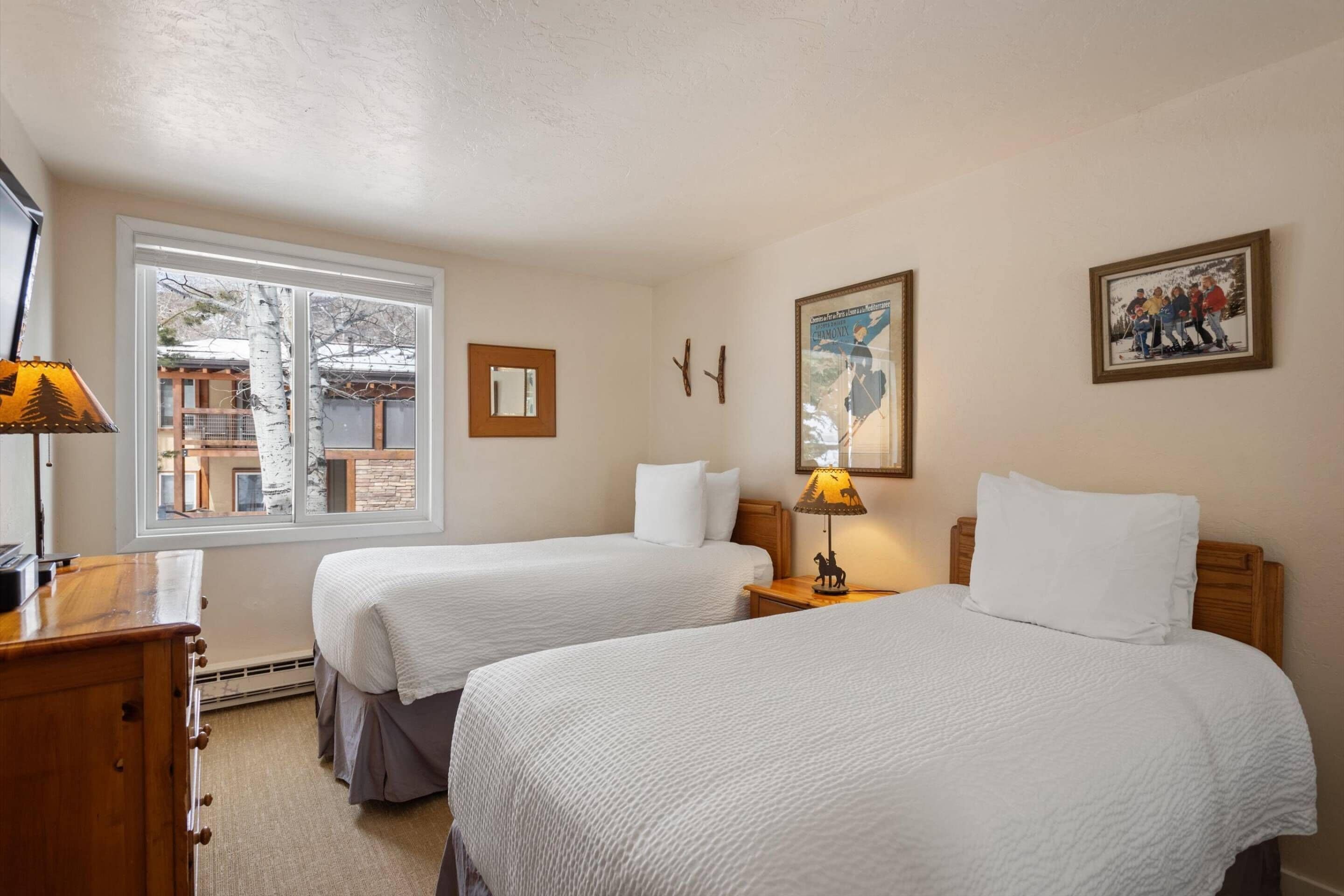The second bedroom has two twin beds and a flat screen TV.  The beds can be bridged to be one king with notice when you book.