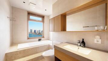 Suite | Bathroom | Hair dryer, towels