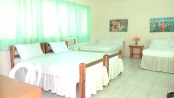 Family Room, Balcony, Beach View | Blackout curtains, iron/ironing board