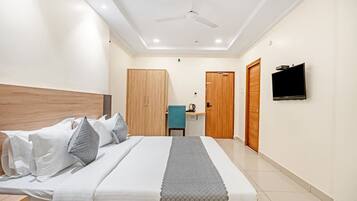 Habitación individual Deluxe | Escritorio y espacio para trabajar con laptop