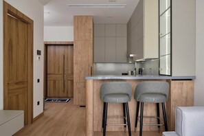 One Bedroom Apartment | Private kitchen | Full-size fridge, microwave, oven, stovetop - STYLO Residences & Suites (Tashkent)