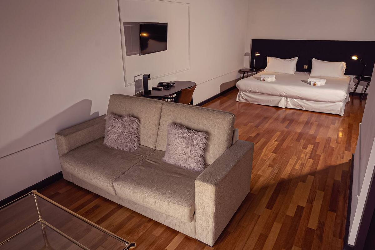 Junior Studio Suite, Lake View | In-room safe, blackout curtains, iron/ironing board (on request)
