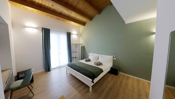 Deluxe kamer, 1 kingsize bed met slaapbank, uitzicht op de stad | Luxe beddengoed, donsdekens, bedden met traagschuimmatrassen