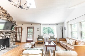 Smart TV, fireplace, books