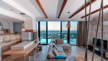 Grande Villa | Área de sala de estar | Televisión LCD de 120 cm con canales vía satélite