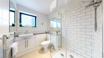 Shower, hair dryer, towels, soap