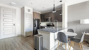 Fridge, dining tables - Landing | Spectacular 1BD, Yoga Studio, Pool (Austin)