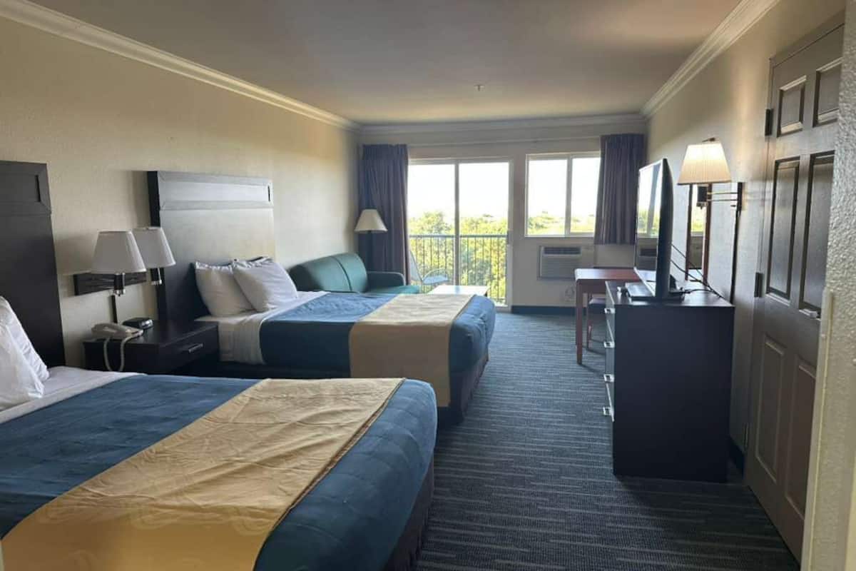 Superior Room, Multiple Beds, Non Smoking, Ocean View | Blackout drapes, iron/ironing board, free WiFi, bed sheets