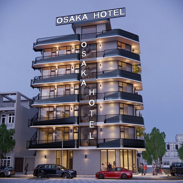 A multi-story hotel with a prominent sign reading "OSAKA HOTEL". - Osaka Boutique Phan Thiet Hotel (Phu Thuy)