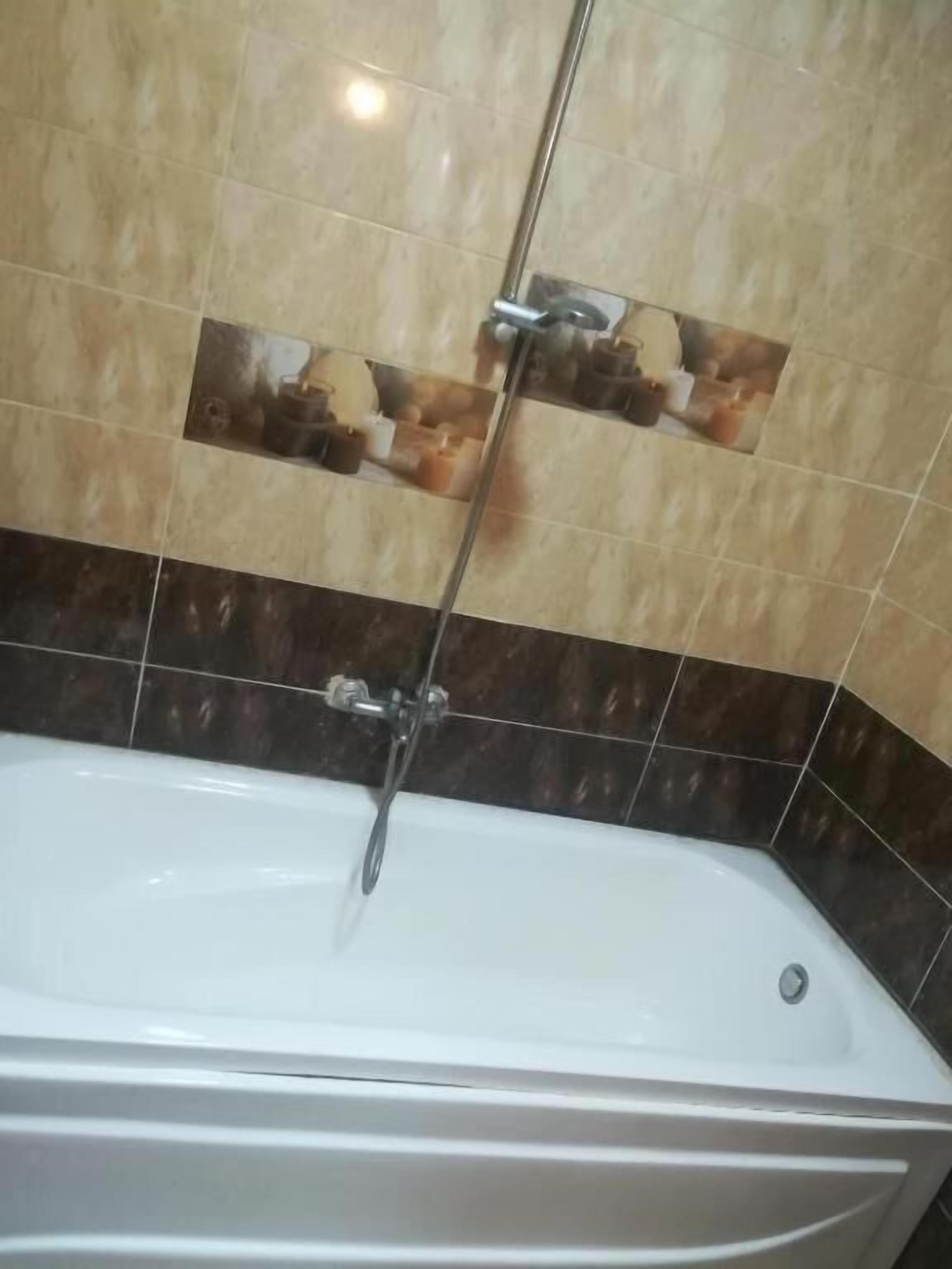 Separate bathtub and shower, free toiletries, hair dryer, bathrobes