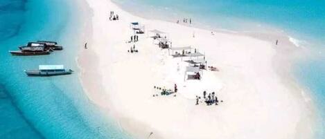 On the beach, sun loungers