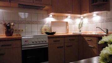 Fridge, stovetop, coffee/tea maker, electric kettle