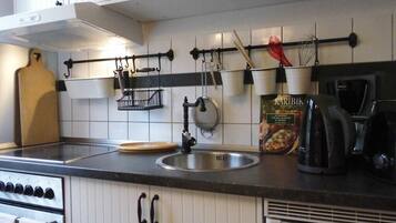 Fridge, stovetop, coffee/tea maker, electric kettle