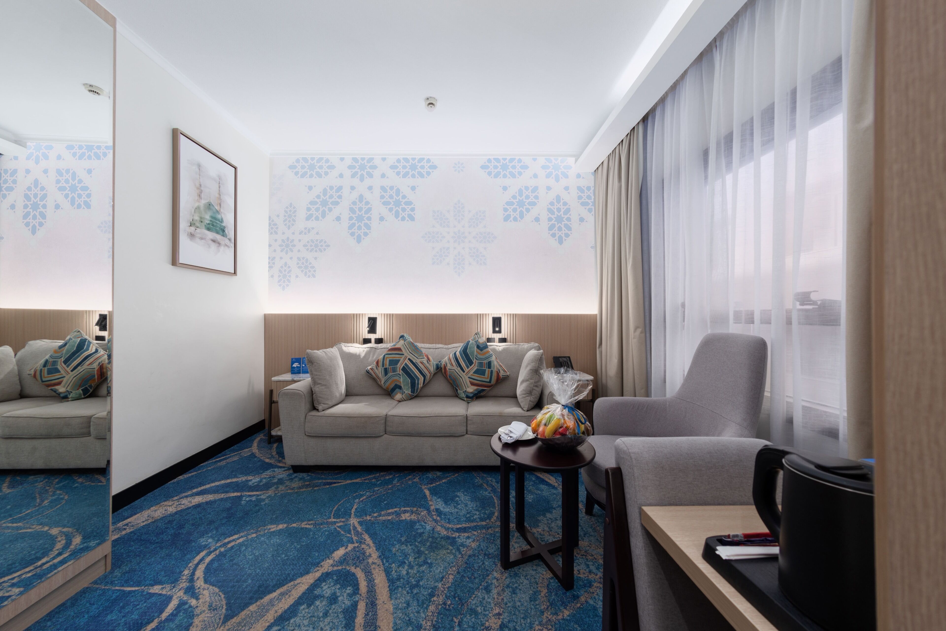 Executive Suite | Living room | 40-inch LCD TV with satellite channels