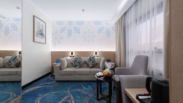 Executive Suite | Living room | 40-inch LCD TV with satellite channels