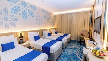 Standard Quadruple Room | In-room safe, individually decorated, individually furnished, desk