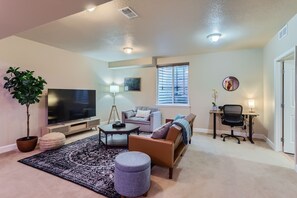 Smart TV, fireplace, video games, foosball