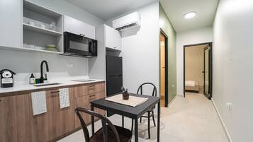 Fridge, microwave, stovetop, coffee/tea maker