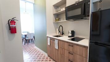 Fridge, microwave, stovetop, coffee/tea maker