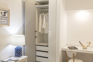Deluxe Room | Down comforters, in-room safe, desk, laptop workspace