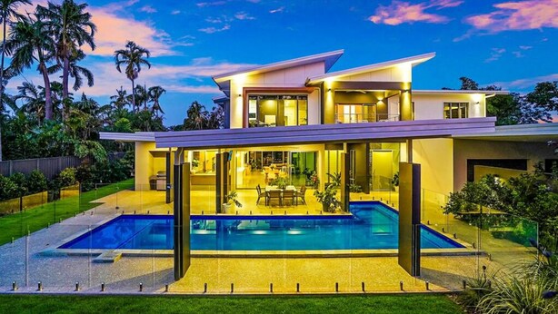 A modern two-story house with a swimming pool, large windows, and a well-maintained lawn. - Fred s at Fannie Bay - NT (Fannie Bay)