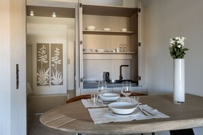 Superior Suite | Private kitchen | Fridge, stovetop, electric kettle, cookware/dishes/utensils